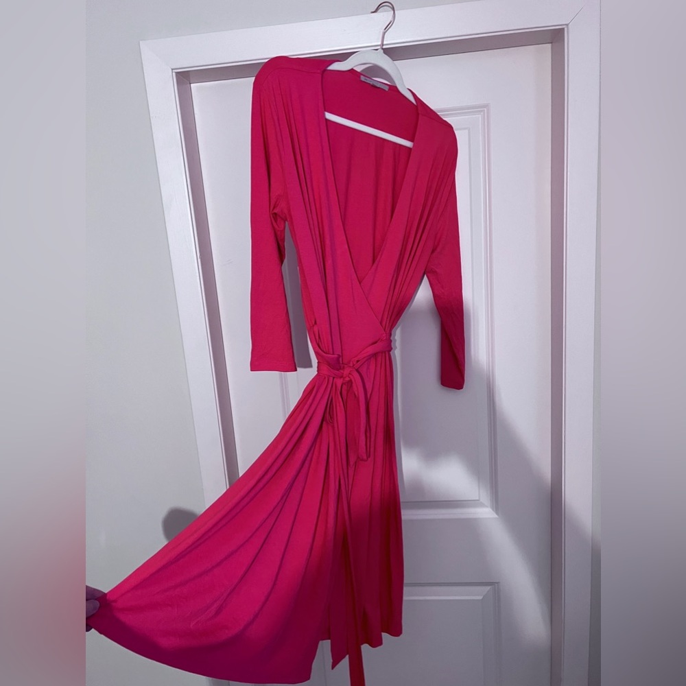 Pink wrap dress. Never worn, body skimming NWOT